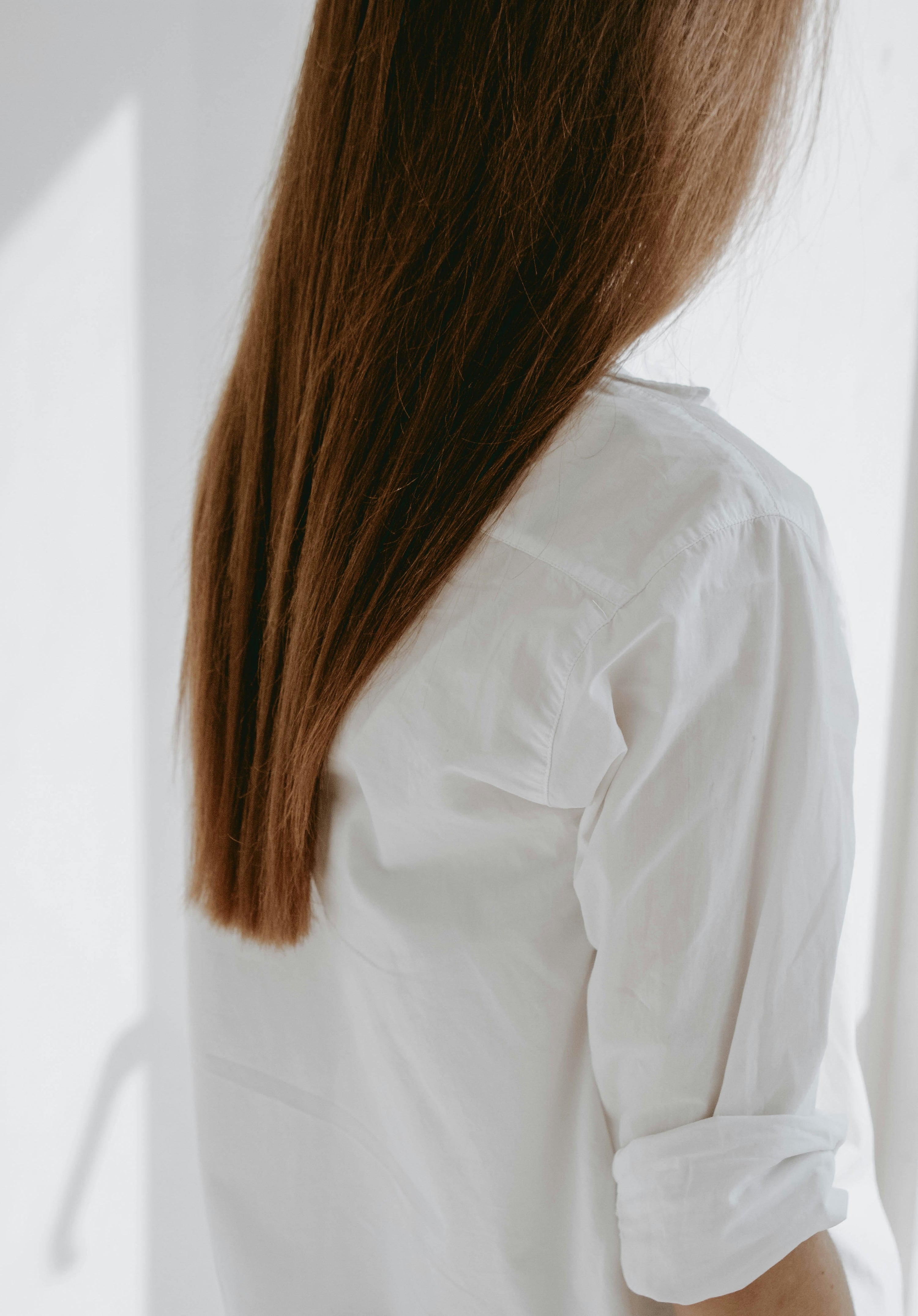 women promoting healthy looking hair